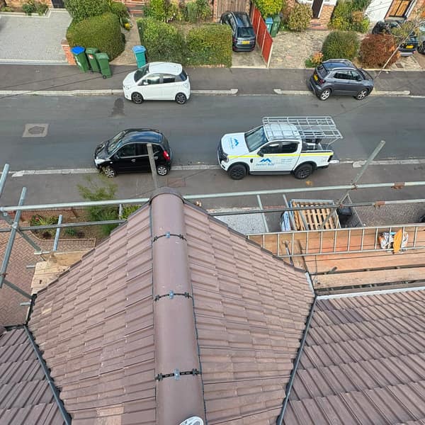 Looking down the new hip from the top of the roof, Watford